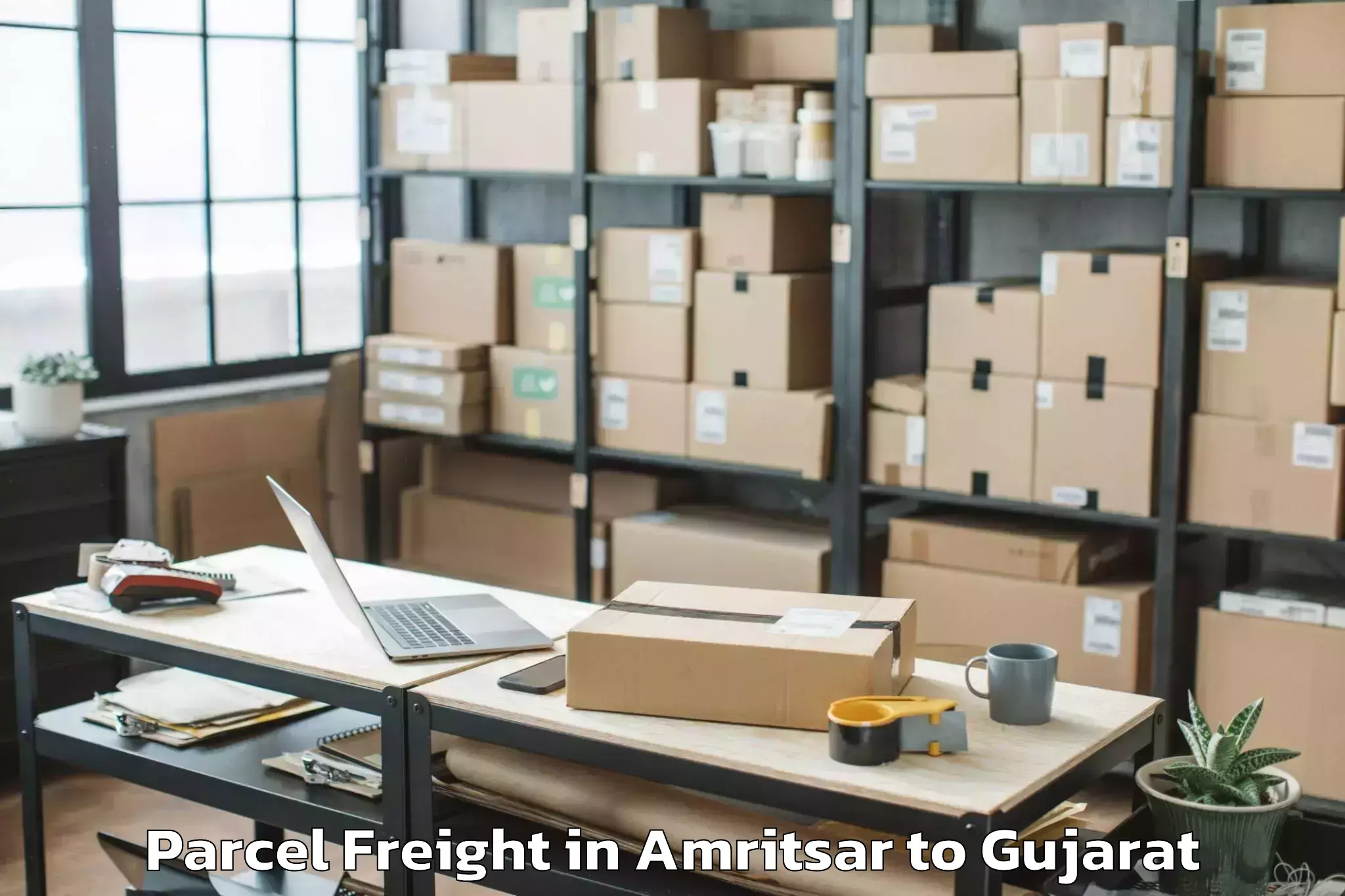 Book Amritsar to Delvada Parcel Freight